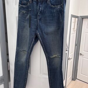 New with tags BLANK NYC Women’s  Blue Distressed Jeans Mid Rise Skinny 31